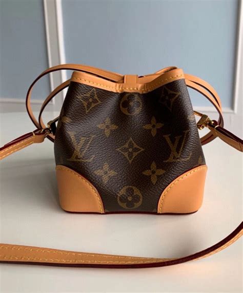 lv m57099|Louis Vuitton Noe Purse Monogram Brown .